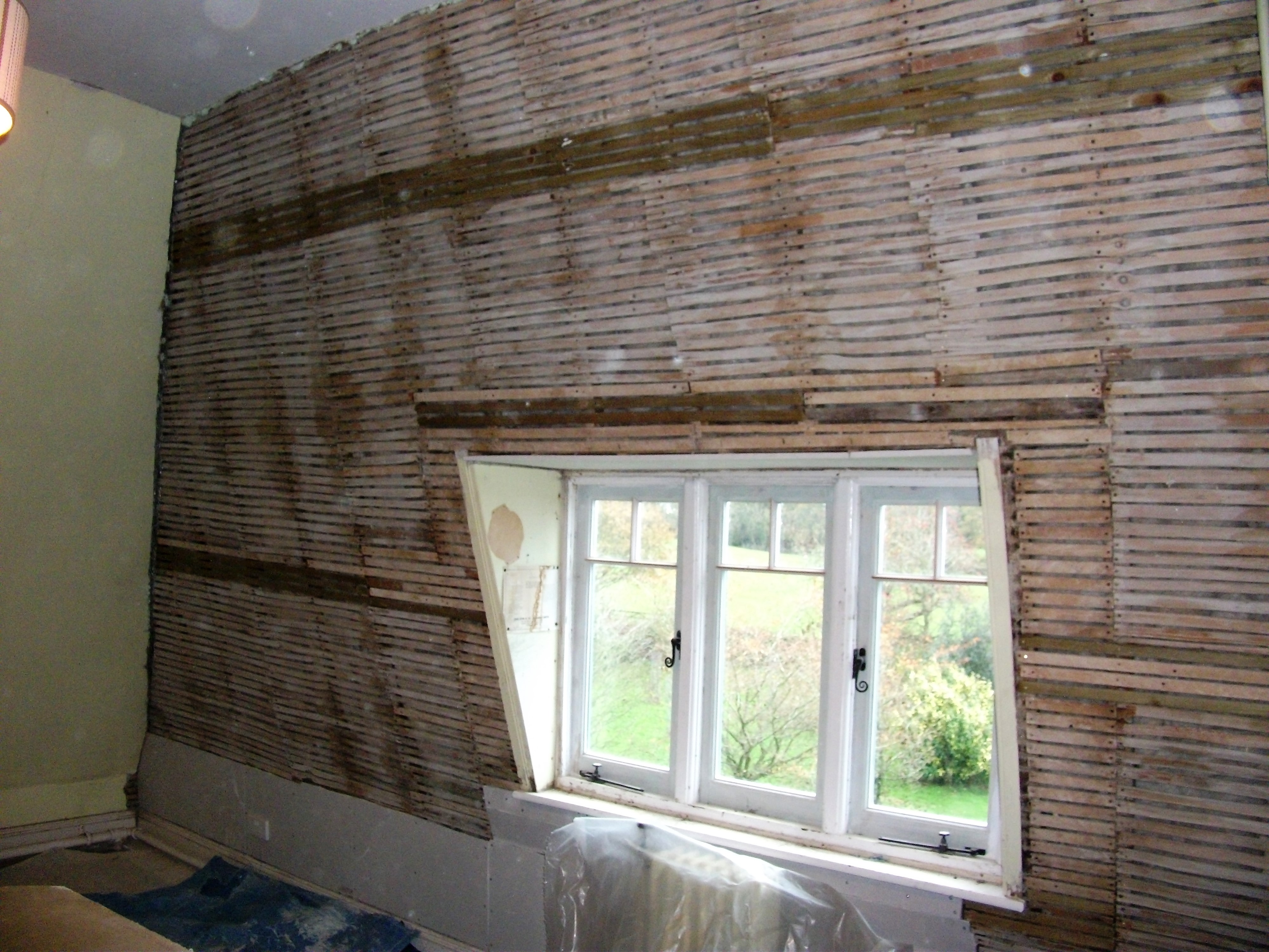 Existing laths ready for the first coat of Hemp lime plaster