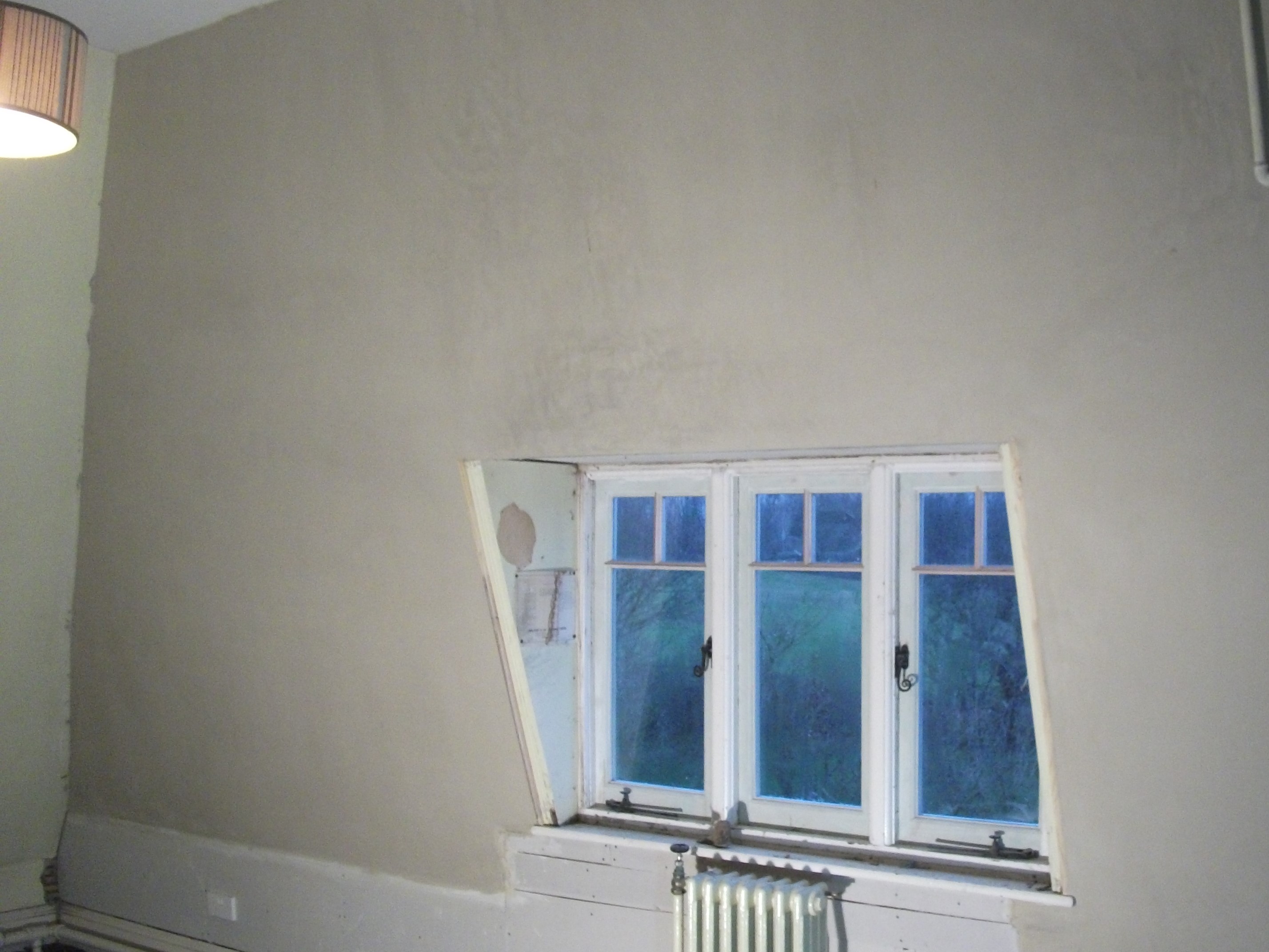 Hemp lime plastering, The lath and hemp plastered wall has been top coated with lime