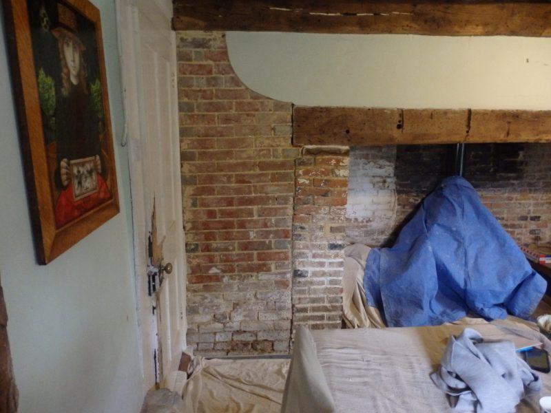 Grade II listed , timber framed building. The damaged, blown lime render has been removed and is going to be prepared, ready to receive three coats of lime plaster.