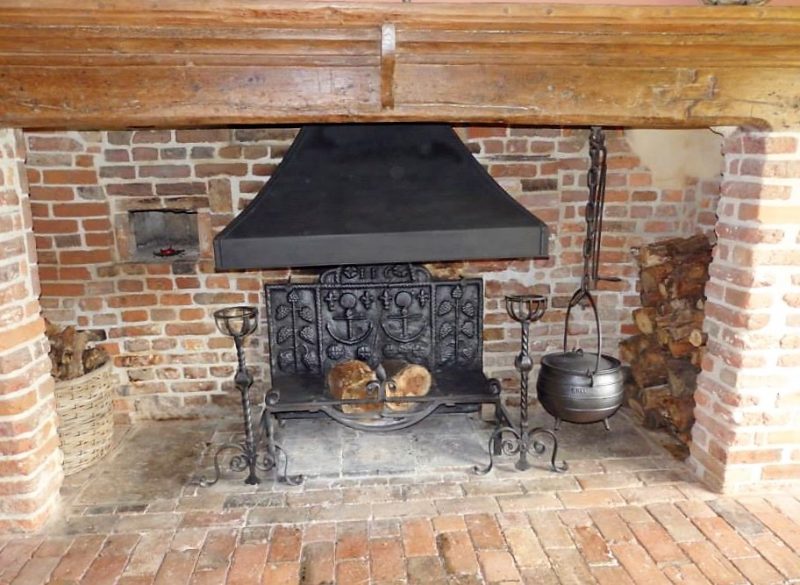 17th Century Brick Ingleknook fireplace, after being lime pointed