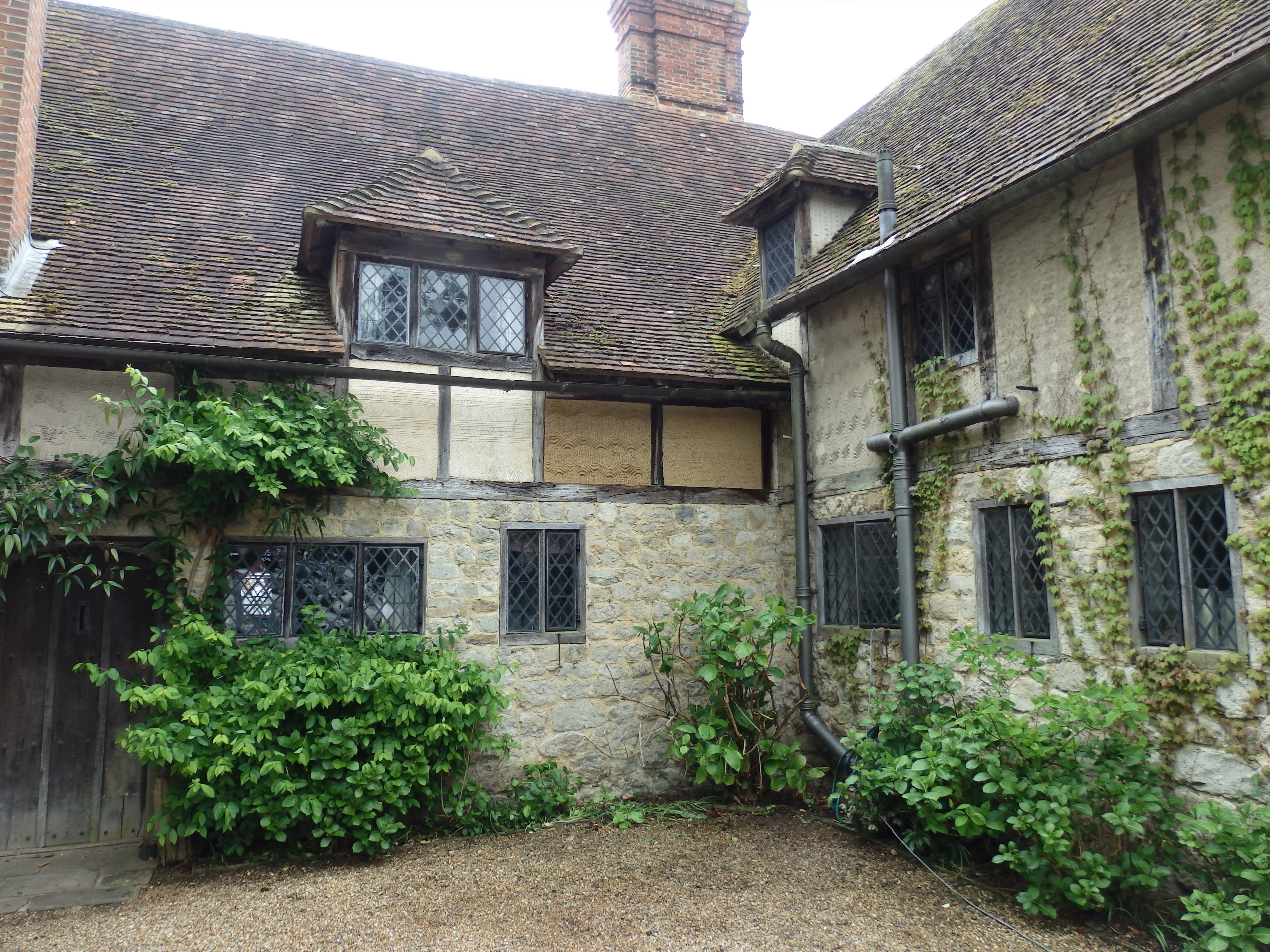Otham Manor. A Grade 1 listed property, dating around 1370. Lime rendered panels repaired with markings, to match the original panels.